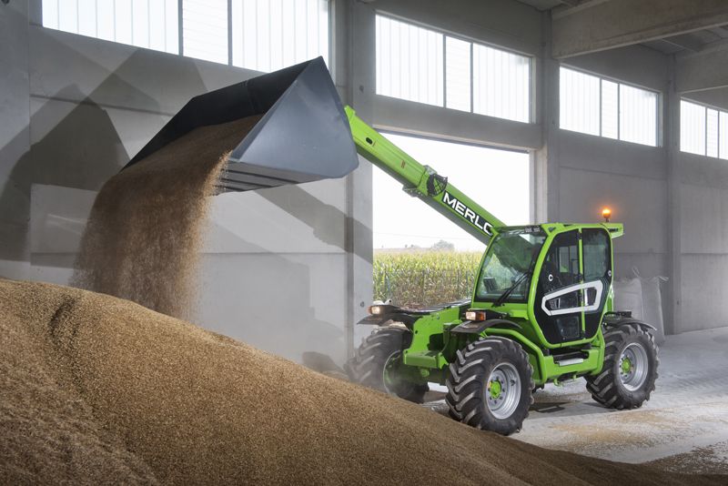 Merlo telehandler lifting hay